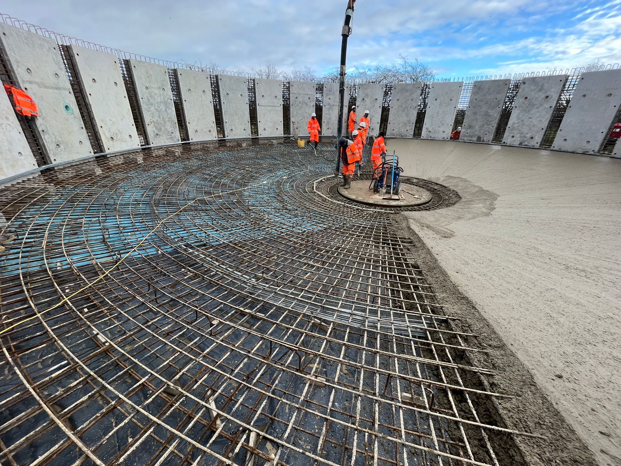 Site engineers and construction workers on project site